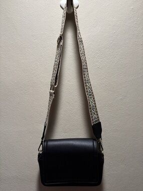 Classic Black Crossbody Bag with Patterned Strap